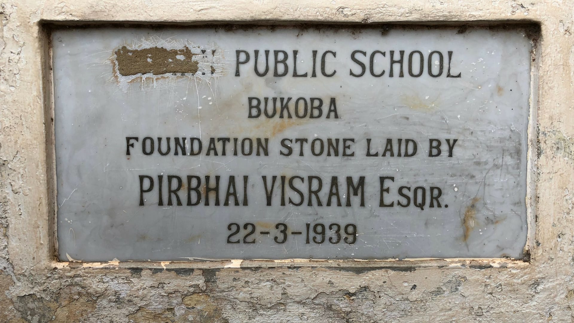 A plaque with foundation stone of Bukoba School