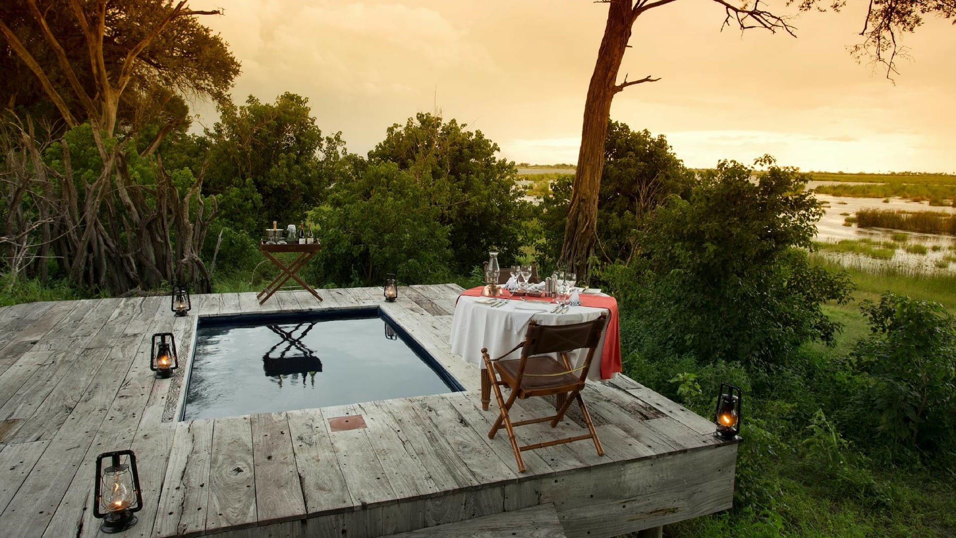 A deck with a plunging pool at Zarafa - Botswana