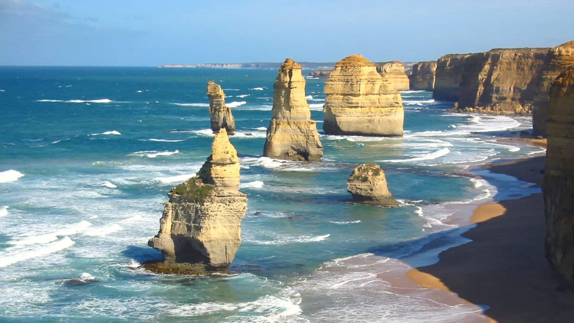 Visit Australia for: The Twelve Apostles in Australia standing in the sea