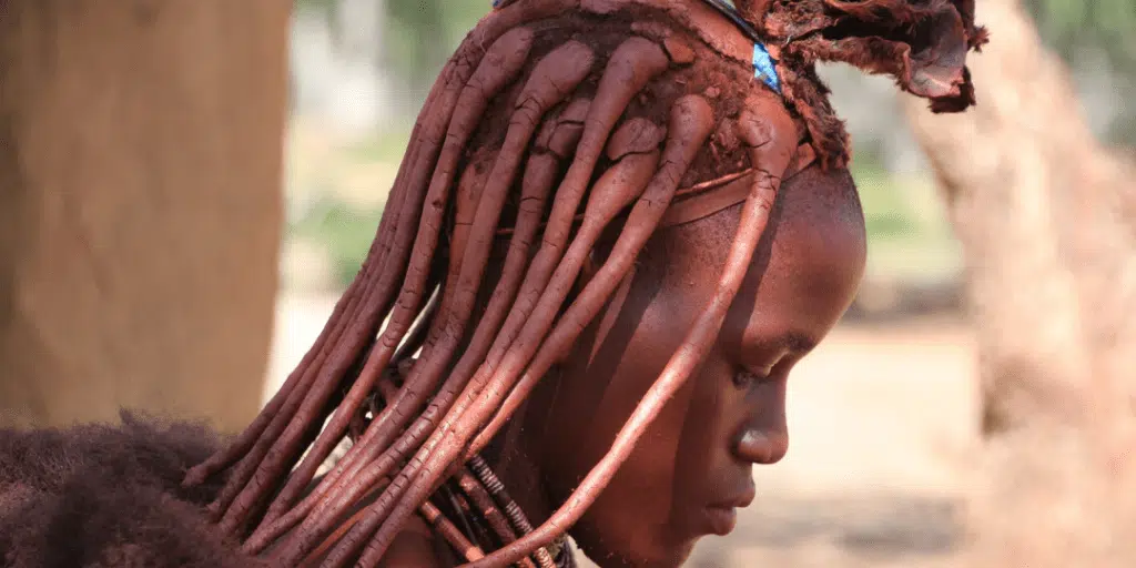OvaHimba (Himba) lady with traditional otjize hair braids