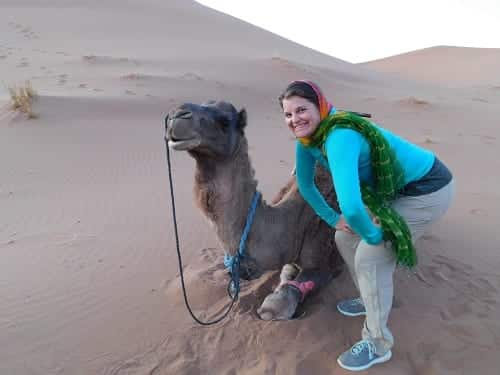 Jessica Faith near a camel in Morocco