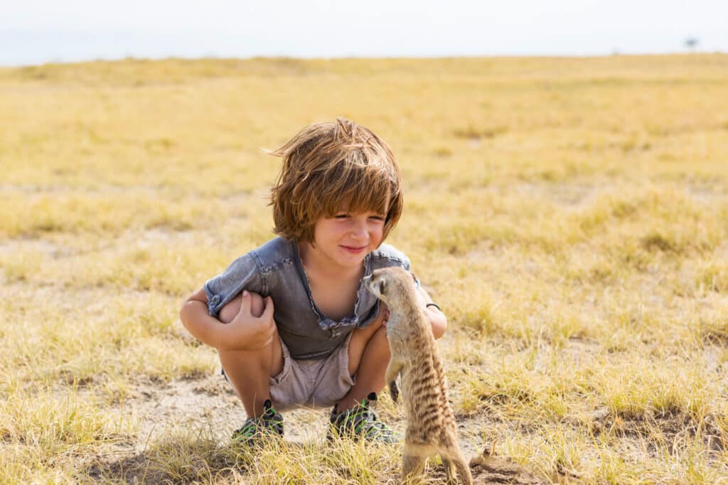 Makgadikgadi Pans National Park - 5 Year Old Boy Looking At Meerkats,Kids on safari